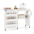 Folding Sewing Table with Charging Station, Rolling Craft Table w/ 3 Storage Trays & Shelf, Mobile Sewing Machine Cabinet for Small Spaces